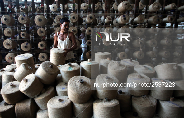 Workers busy in making jute sacks at Latif Bawany Jute Mills in Demra, Dhaka, on 5 March 2018 amid the country is ready to celebrate Nationa...