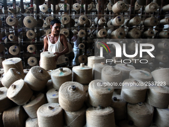 Workers busy in making jute sacks at Latif Bawany Jute Mills in Demra, Dhaka, on 5 March 2018 amid the country is ready to celebrate Nationa...