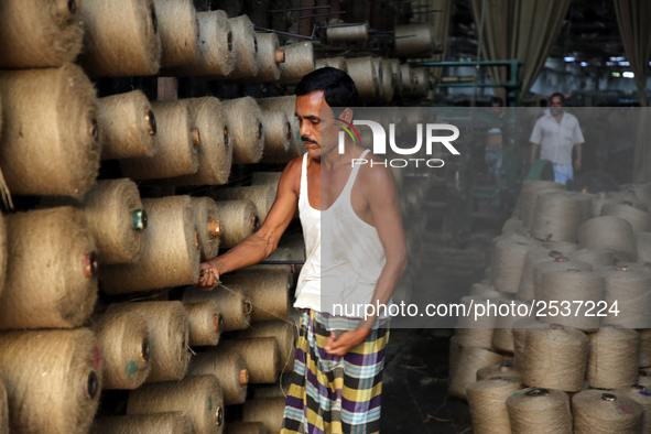 Workers busy in making jute sacks at Latif Bawany Jute Mills in Demra, Dhaka, on 5 March 2018 amid the country is ready to celebrate Nationa...