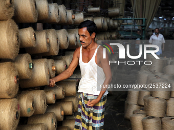 Workers busy in making jute sacks at Latif Bawany Jute Mills in Demra, Dhaka, on 5 March 2018 amid the country is ready to celebrate Nationa...