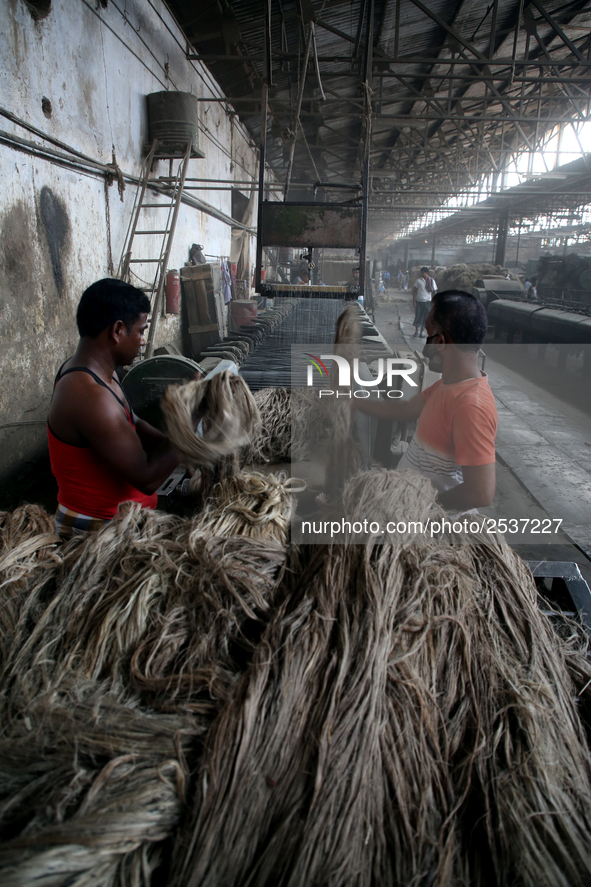 Workers busy in making jute sacks at Latif Bawany Jute Mills in Demra, Dhaka, on 5 March 2018 amid the country is ready to celebrate Nationa...