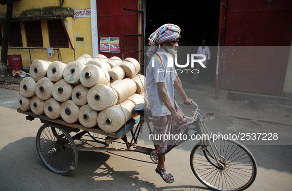 Workers busy in making jute sacks at Latif Bawany Jute Mills in Demra, Dhaka, on 5 March 2018 amid the country is ready to celebrate Nationa...