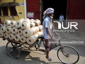 Workers busy in making jute sacks at Latif Bawany Jute Mills in Demra, Dhaka, on 5 March 2018 amid the country is ready to celebrate Nationa...