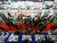 People visit the "Paris pour l'emploi" (Paris for Employment) recruitment forum on March 6, 2018, at the Grande Halle de La Villette in Pari...