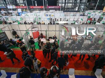 People visit the "Paris pour l'emploi" (Paris for Employment) recruitment forum on March 6, 2018, at the Grande Halle de La Villette in Pari...