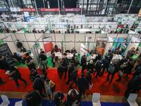 People visit the "Paris pour l'emploi" (Paris for Employment) recruitment forum on March 6, 2018, at the Grande Halle de La Villette in Pari...