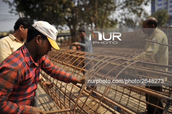 Migrated workers from India working at on-going Bridge expansion work supported by China AID at Tinkune, Kathmandu, Nepal on Thursday, March...