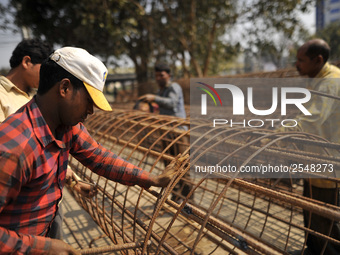 Migrated workers from India working at on-going Bridge expansion work supported by China AID at Tinkune, Kathmandu, Nepal on Thursday, March...