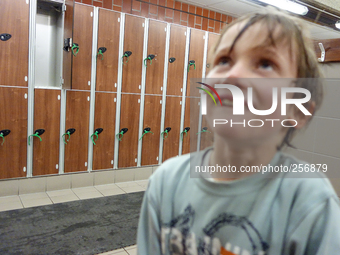 London, Robin at seven years old in the changing room before his swimming lesson, sometime lost his concentration get dressed up, focusing h...