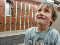 London, Robin at seven years old in the changing room before his swimming lesson, sometime lost his concentration get dressed up, focusing h...