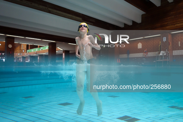 London, Robin at eight years old during his swimming lesson decided to spent time having fun in the water. 