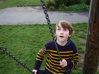 London, Robin at seven years old in Brokwell park having fun. (