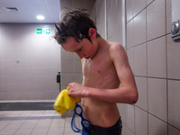 London, Robin at eight years old, just finished his swimming lesson were he did not get his free time starting to be angry for the rest of t...