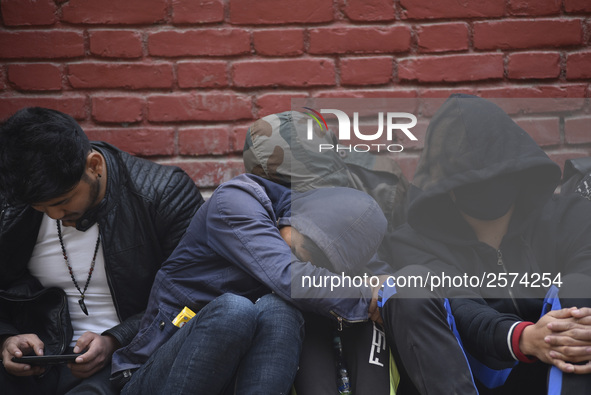 Nepalese Youths sleeping in a line in the early morning to pay the amount for the application submission for the Korean Language Test (KLT)...