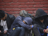 Nepalese Youths sleeping in a line in the early morning to pay the amount for the application submission for the Korean Language Test (KLT)...