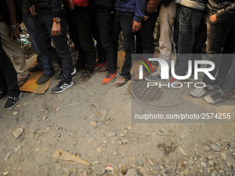 Foots of Nepalese Youths seen as line up to pay the amount for the application submission for the Korean Language Test (KLT) under the Korea...