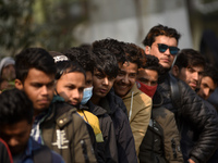 Nepalese Youths line up to pay the amount for the application submission for the Korean Language Test (KLT) under the Korea Employment Permi...