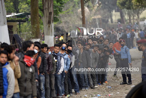 Nepalese Youths line up to pay the amount for the application submission for the Korean Language Test (KLT) under the Korea Employment Permi...