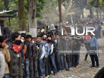 Nepalese Youths line up to pay the amount for the application submission for the Korean Language Test (KLT) under the Korea Employment Permi...