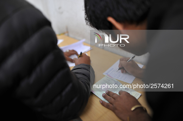 Nepalese Youths filling the pay slip of the amount for the application submission for the Korean Language Test (KLT) under the Korea Employm...