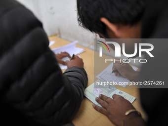 Nepalese Youths filling the pay slip of the amount for the application submission for the Korean Language Test (KLT) under the Korea Employm...