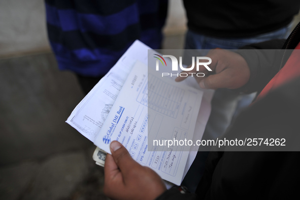 Nepalese Youths filling the pay slip of the amount for the application submission for the Korean Language Test (KLT) under the Korea Employm...