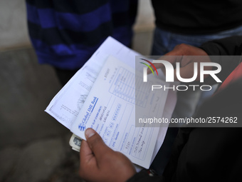 Nepalese Youths filling the pay slip of the amount for the application submission for the Korean Language Test (KLT) under the Korea Employm...