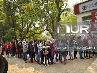 Nepalese Youths line up to pay the amount for the application submission for the Korean Language Test (KLT) under the Korea Employment Permi...