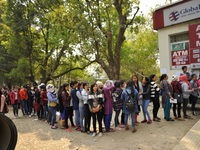 Nepalese Youths line up to pay the amount for the application submission for the Korean Language Test (KLT) under the Korea Employment Permi...