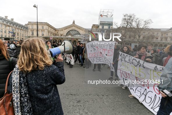 French students protest with employees of the French state owned railway company SNCF during a demonstration in front of the Gare de l’Est t...