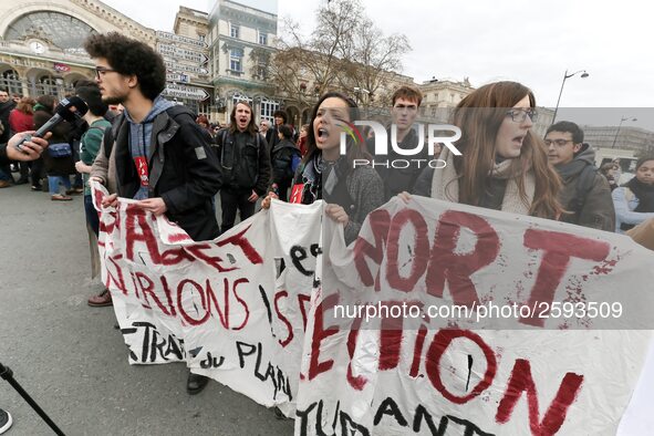 French students protest with employees of the French state owned railway company SNCF during a demonstration in front of the Gare de l’Est t...