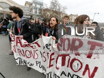 French students protest with employees of the French state owned railway company SNCF during a demonstration in front of the Gare de l’Est t...