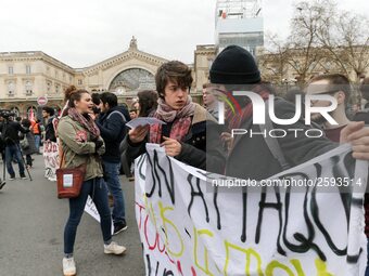 French students protest with employees of the French state owned railway company SNCF during a demonstration in front of the Gare de l’Est t...