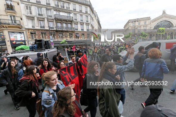 French students protest with employees of the French state owned railway company SNCF during a demonstration in front of the Gare de l’Est t...