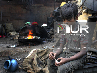 Child labor is common sight in Dhaka, Bangladesh, on 4 April 2018. According to a statistics report 2015 in Bangladesh there are 3.5 million...