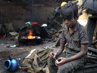 Child labor is common sight in Dhaka, Bangladesh, on 4 April 2018. According to a statistics report 2015 in Bangladesh there are 3.5 million...