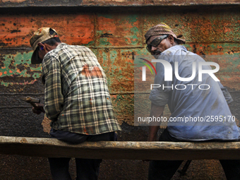 Workers are working in a ship-building yard in Dhaka, Bangladesh on 4 April 2018. In Bangladesh ship-building industry is very promising. (