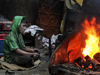 Child labor is common sight in Dhaka, Bangladesh, on 4 April 2018. According to a statistics report 2015 in Bangladesh there are 3.5 million...