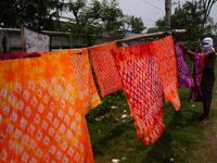 Bangladeshi labors working in the Batik Cloth industry at Narsingdi area near Dhaka, Bangladesh, on April 26, 2018. Each Worker earns par da...