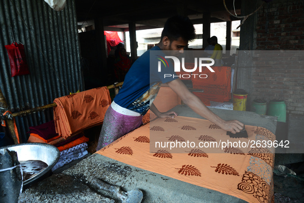 Bangladeshi labors working in the Batik Cloth industry at Narsingdi area near Dhaka, Bangladesh, on April 26, 2018. Each Worker earns par da...