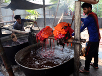 Bangladeshi labors working in the Batik Cloth industry at Narsingdi area near Dhaka, Bangladesh, on April 26, 2018. Each Worker earns par da...