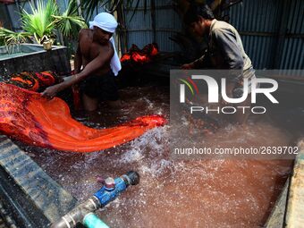 Bangladeshi labors working in the Batik Cloth industry at Narsingdi area near Dhaka, Bangladesh, on April 26, 2018. Each Worker earns par da...