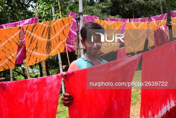 Bangladeshi labors working in the Batik Cloth industry at Narsingdi area near Dhaka, Bangladesh, on April 26, 2018. Each Worker earns par da...