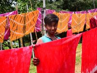 Bangladeshi labors working in the Batik Cloth industry at Narsingdi area near Dhaka, Bangladesh, on April 26, 2018. Each Worker earns par da...