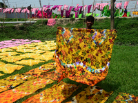 Bangladeshi labors working in the Batik Cloth industry at Narsingdi area near Dhaka, Bangladesh, on April 26, 2018. Each Worker earns par da...