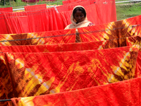 Bangladeshi labors working in the Batik Cloth industry at Narsingdi area near Dhaka, Bangladesh, on April 26, 2018. Each Worker earns par da...