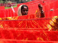 Bangladeshi labors working in the Batik Cloth industry at Narsingdi area near Dhaka, Bangladesh, on April 26, 2018. Each Worker earns par da...