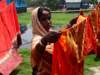 Bangladeshi labors working in the Batik Cloth industry at Narsingdi area near Dhaka, Bangladesh, on April 26, 2018. Each Worker earns par da...