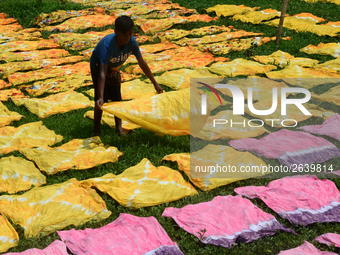 Bangladeshi labors working in the Batik Cloth industry at Narsingdi area near Dhaka, Bangladesh, on April 26, 2018. Each Worker earns par da...