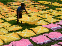 Bangladeshi labors working in the Batik Cloth industry at Narsingdi area near Dhaka, Bangladesh, on April 26, 2018. Each Worker earns par da...